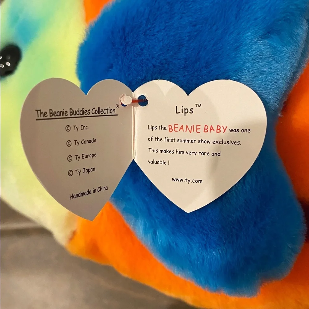 Ty Plush Fish Toy with Orange, Blue, and Purple